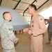 Maj. Gen. Jim Jones tours an undisclosed location in Southwest Asia