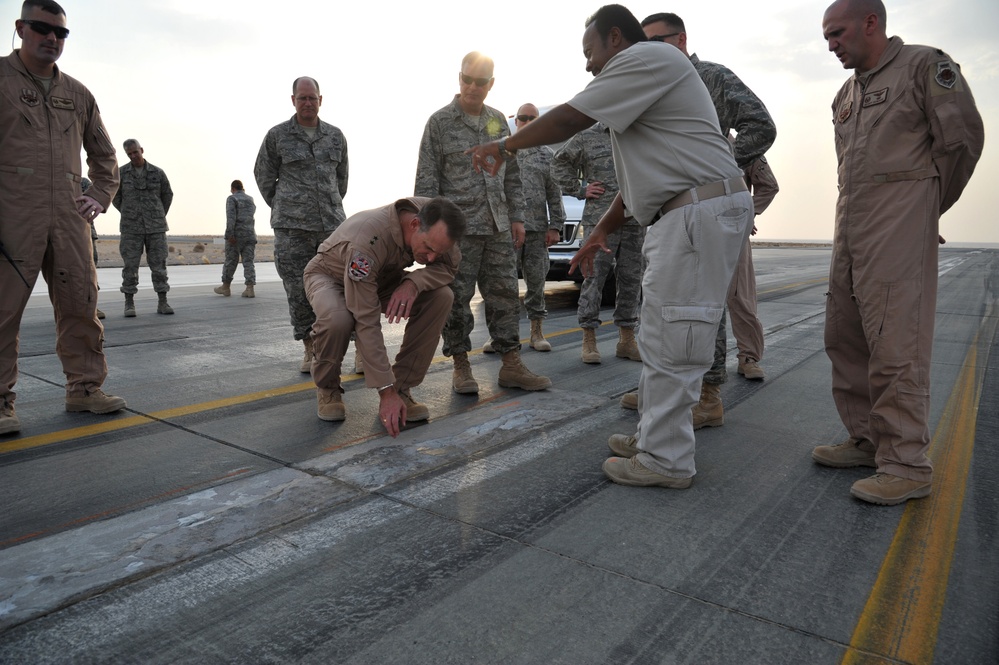 Maj. Gen. Jim Jones tours an undisclosed location in Southwest Asia