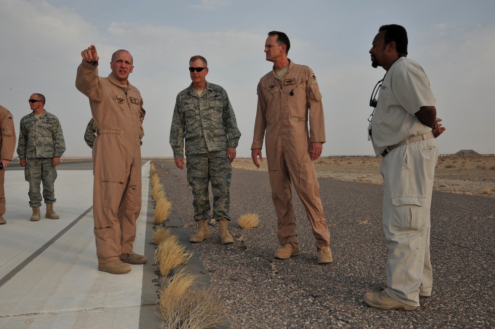 Maj. Gen. Jim Jones tours an undisclosed location in Southwest Asia