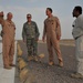 Maj. Gen. Jim Jones tours an undisclosed location in Southwest Asia