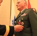 Col. Michael F. Davino receives the Legion of Merit