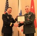 Col. Michael F. Davino receives the Legion of Merit