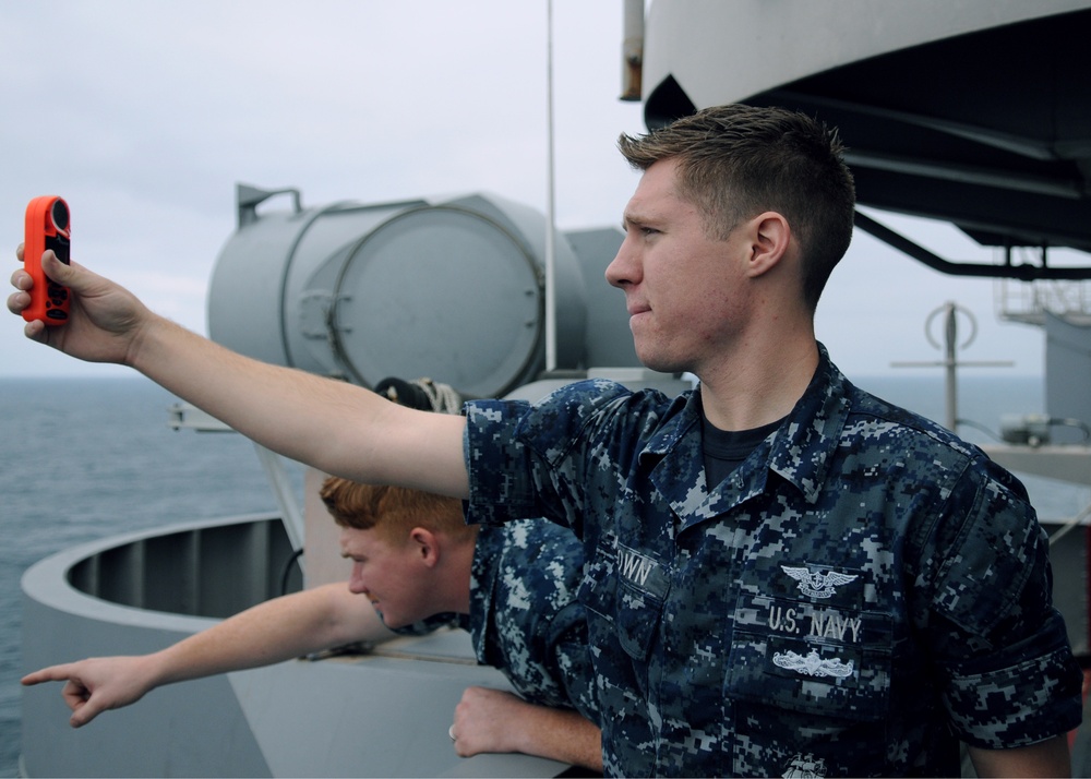 Airman conducts weather observation report