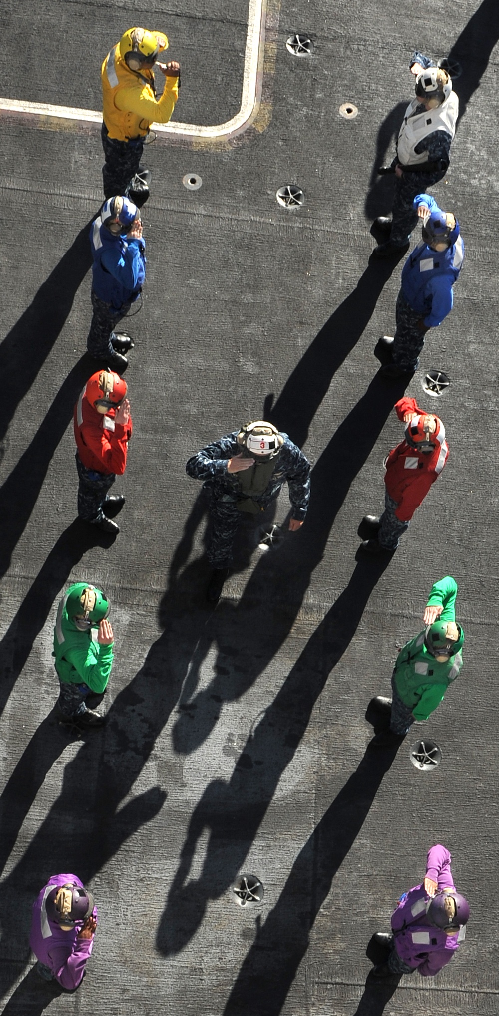 Vice Adm. Beaman salutes USS Abraham Lincoln rainbow sideboys