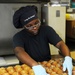 USS George H.W. Bush sailors prepares muffins