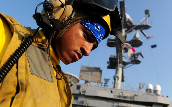 USS John C. Stennis airman apprentice at work