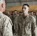 Top Marine general pins Purple Heart on helicopter technician