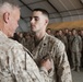 Top Marine general pins Purple Heart on helicopter technician