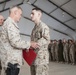 Top Marine general pins Purple Heart on helicopter technician