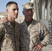 Top Marine general pins Purple Heart on helicopter technician