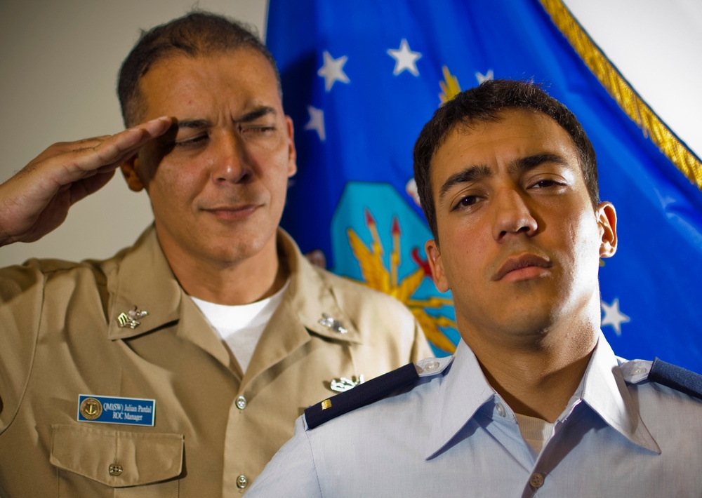 Petty Officer salutes newly commissioned Air Force son