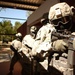 Soldiers prepare to breach