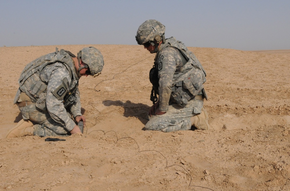 Explosive Ordnance Disposal soldiers at work