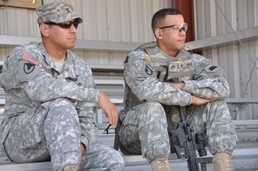 California National Guard soldiers competing for the title of 2011 Best Warrior get support from their fellow warrior
