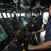 USS Dewey sailor steers through Spratly Islands