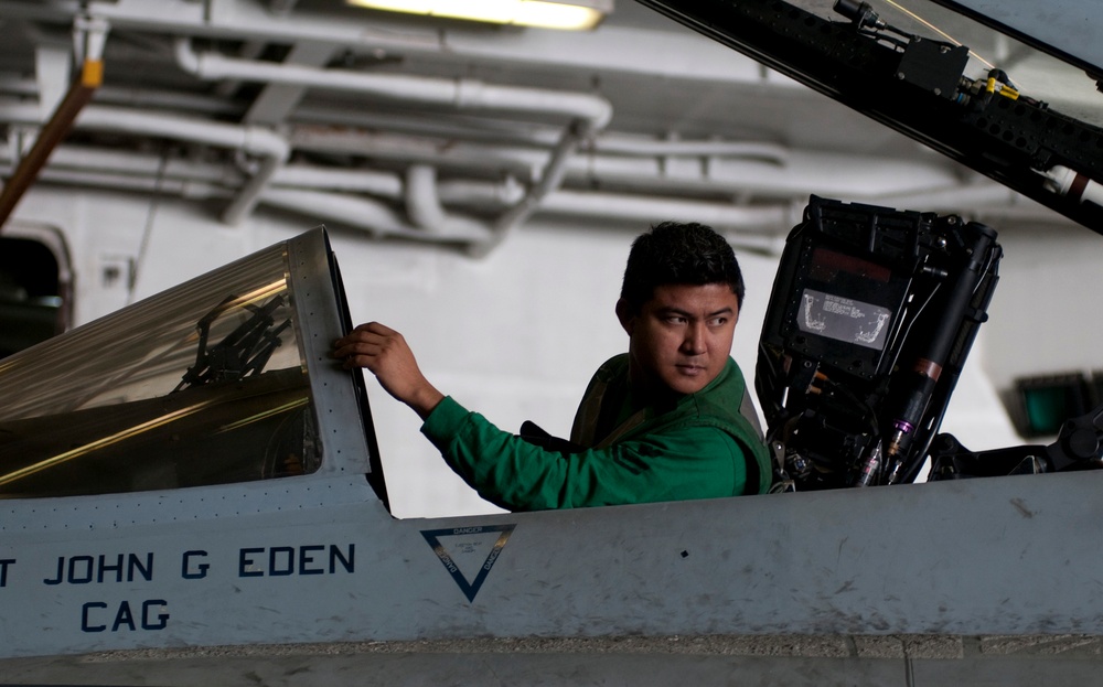 USS Abraham Lincoln sailor rides in F/A-18F Super Hornet