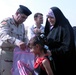 ‘Vanguard’ Battalion soldiers help 9th Iraqi Army Division put smiles on childrens’ faces at school supply drop
