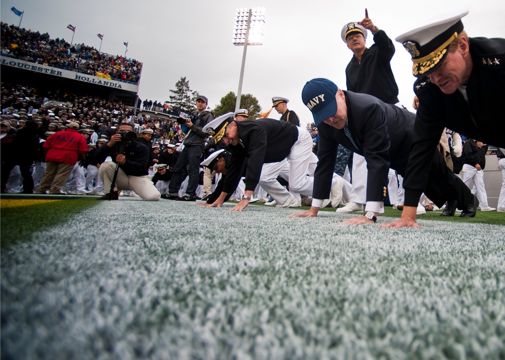 DVIDS Images Naval leaders do pushups at US Naval Academy football