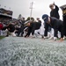 Naval leaders do pushups at US Naval Academy football game