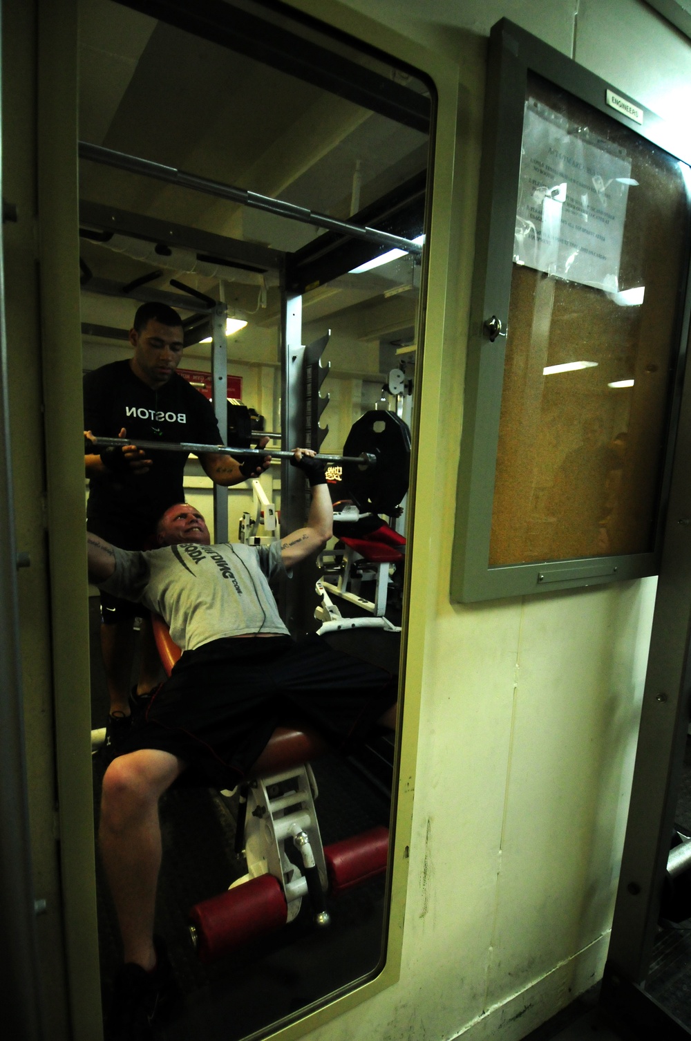 USS George H.W. Bush sailors work out in gym