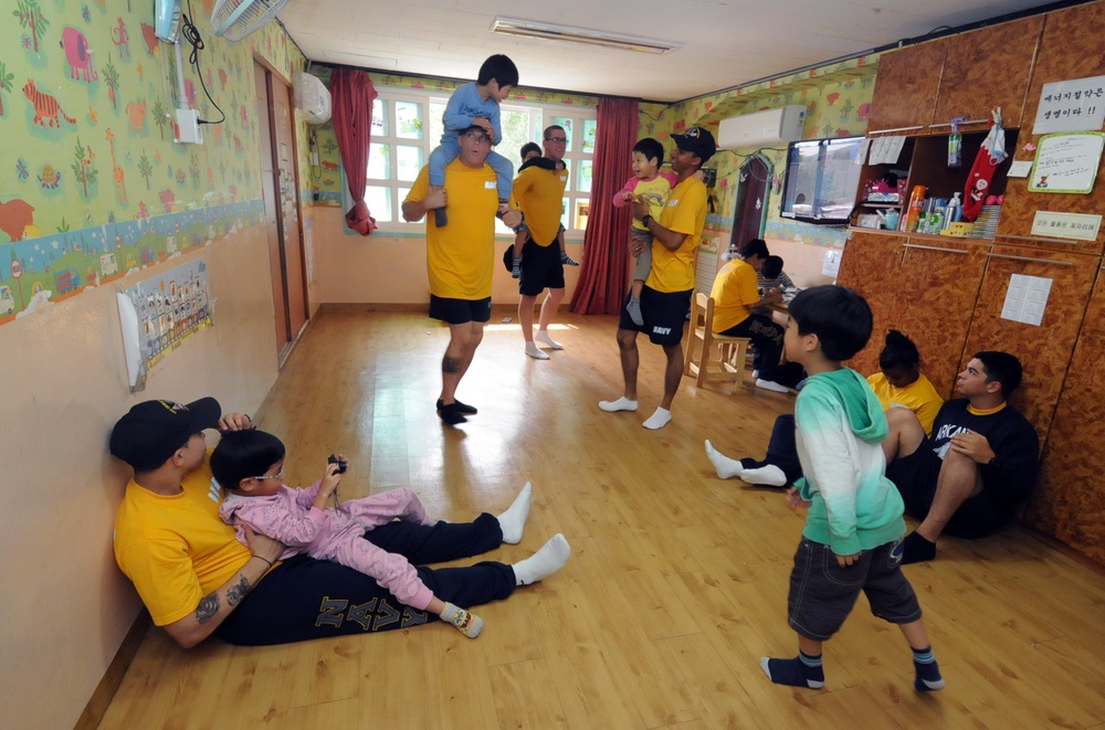 USS George Washington sailors visit Busan orphanage