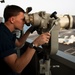 USS John C. Stennis sailor stands lookout