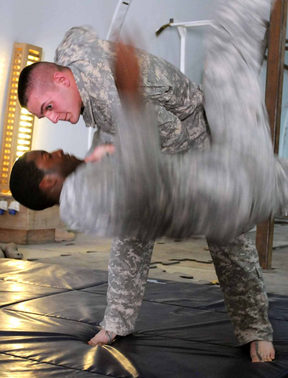 Judo-surfing soldier signals for waves in Iraq