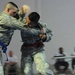 Judo-surfing soldier signals for waves in Iraq