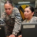 Communications Communications Soldier looks over computertroops keep soldiers ‘in the loop’