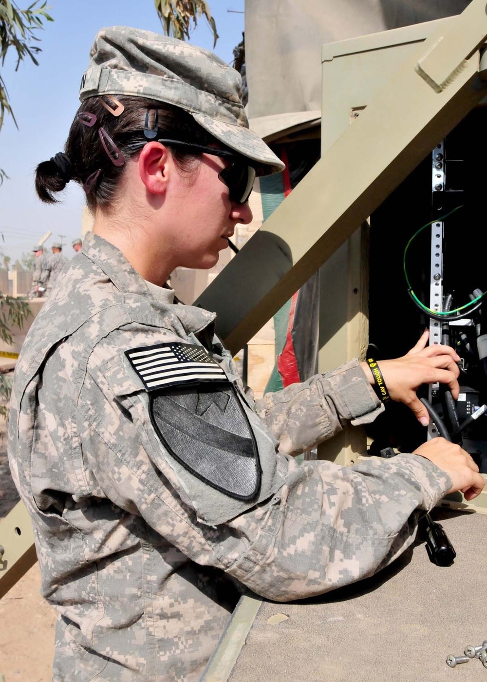 Communications Soldier maintains an antenna