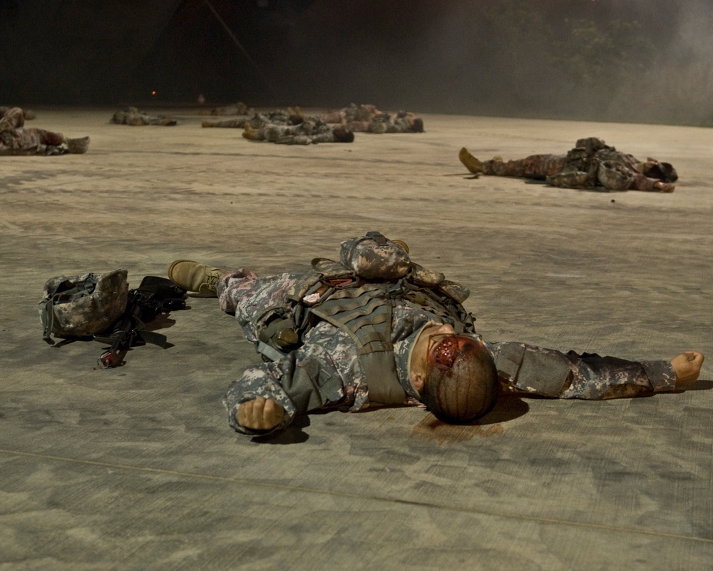 Quartermaster soldiers play dead