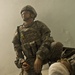 Barger evaluates a casualty in the smokey haze