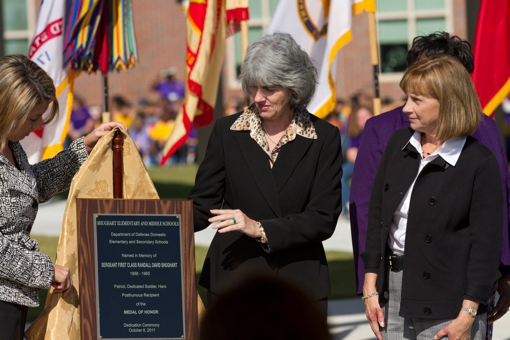 Plaque unveiling at Shughart Schools dedication