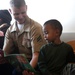 Service members at Fleet Week visit children at San Francisco General Hospital