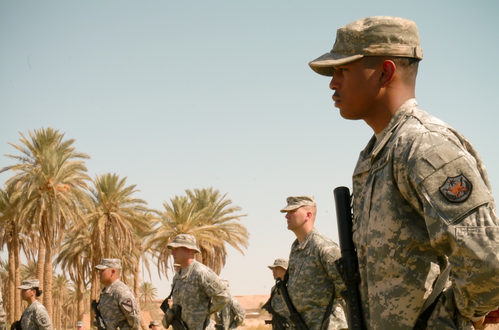 US service members reenlist at Iraqi oasis