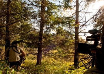Camera guy documenting assault