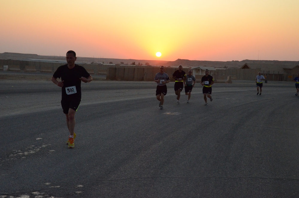 Service members deployed to Iraq shadow run the Army 10-Miler