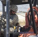 580th Signal soldier digs the ditch for signal operations