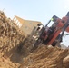 580th Signal soldier digs the ditch for signal operations