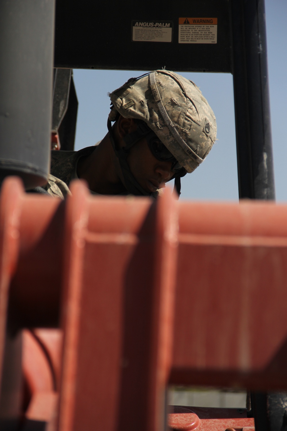 580th Signal soldier digs the ditch for signal operations