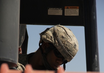 580th Signal soldier digs the ditch for signal operations