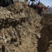 580th Signal soldier digs the ditch for signal operations