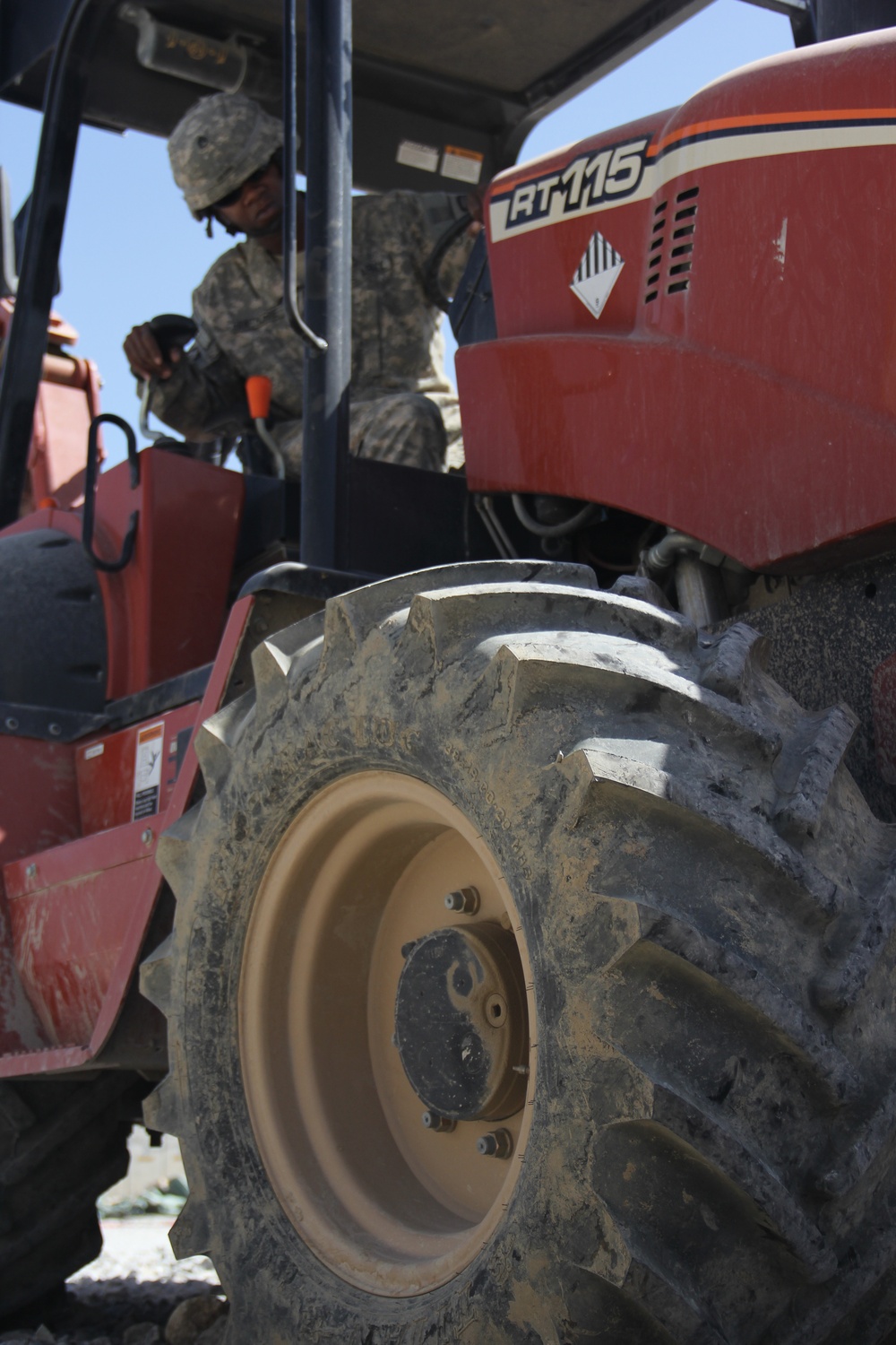 580th Signal soldier digs the ditch for signal operations