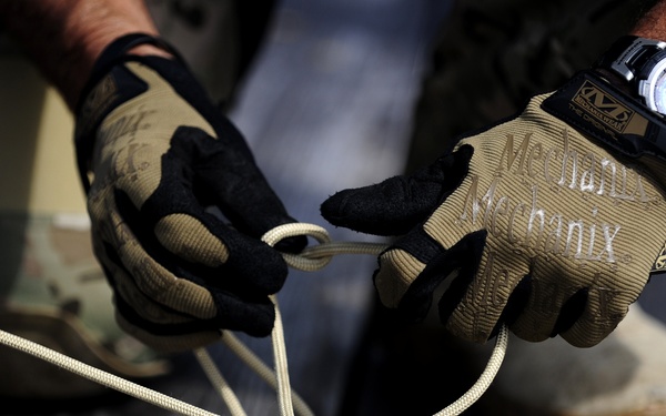 PJ secures a rappelling line