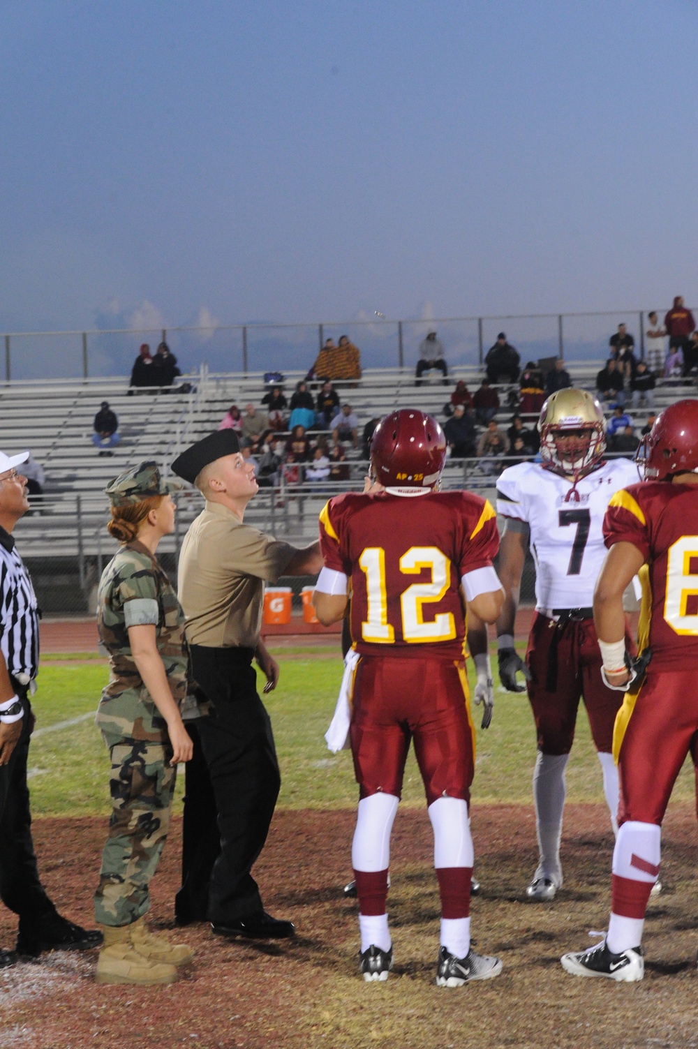 Seabee conduct high school game coin toss
