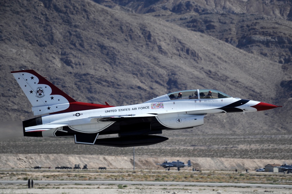 IndyCar driver J.R. Hildebrand flies with the Thunderbirds