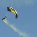 Parachuter prepares to land during 40th annual Albuquerque International Balloon Fiesta