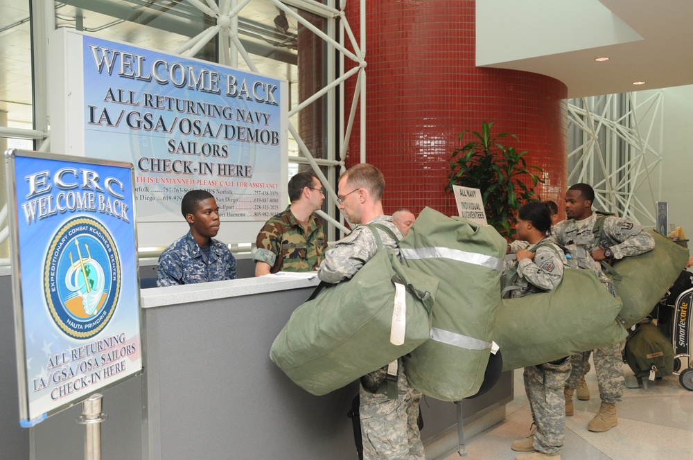 Sailors check in at Baltimore airport