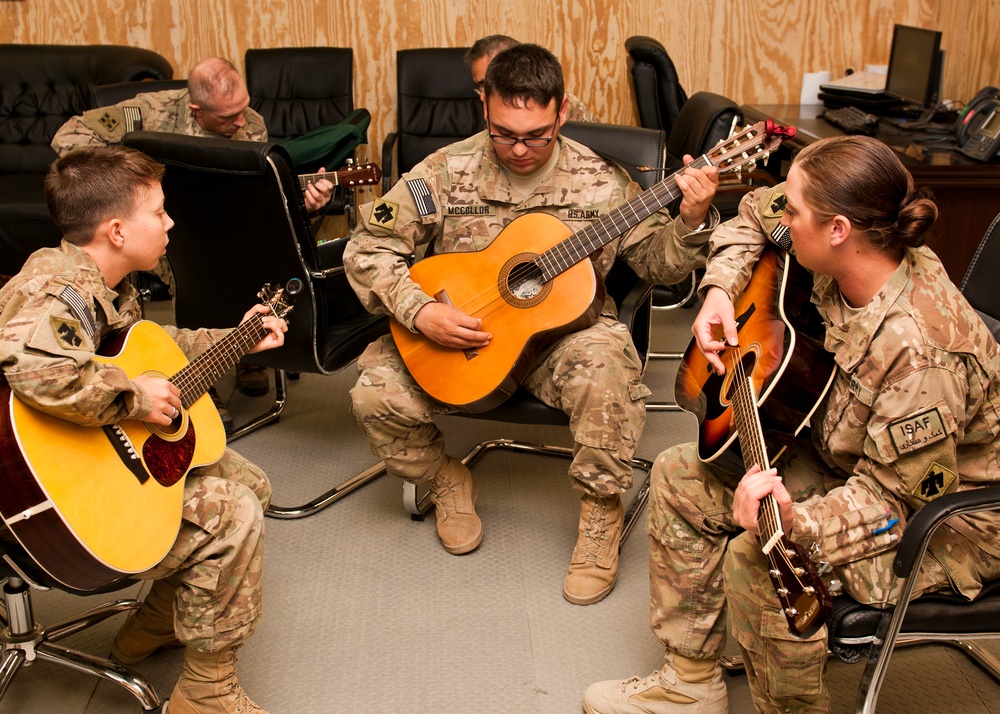 Soldiers pass time with music