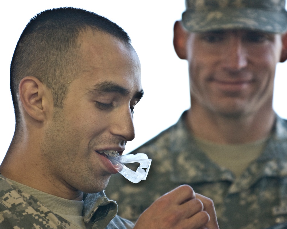 Couchot jokes around between combatives matches